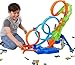 Produktbild Hot Wheels Spielzeugauto Trackset mit 4 Loopings, 3-spuriger Crash-Zone und batteriebetriebenem Beschleuniger, zur Aufbewahrung zusammenklappbar, mit Spielzeugauto im Maßstab 1:64, HXT06