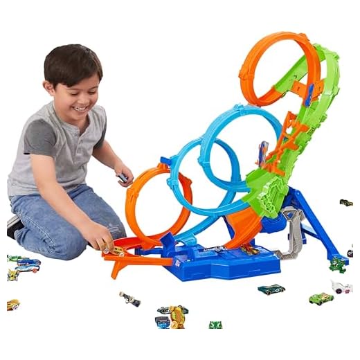 Hot Wheels Action Vueltas y choques desafiantes, Pista para Coches de Juguete Plegable con 4 loopings, Lanzador y 1 vehículo Die-Cast a Escala 1:64, Regalo para niños y niñas +5 años, HXT06