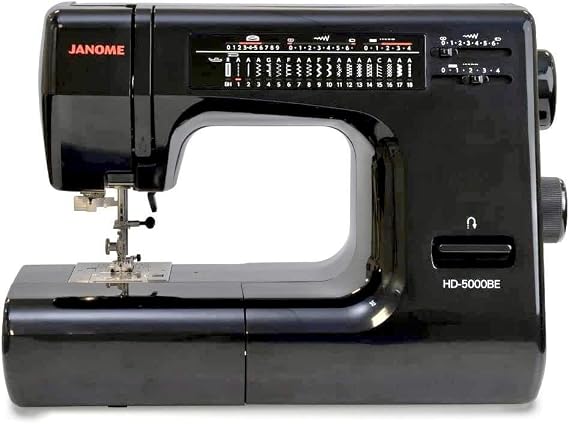 Janome HD-5000 Black Edition آلة الخياطة الثقيلة مع هيكل من الألومنيوم ، 18 غرز ، ذراع مجاني ، وخيط إبرة مدمج