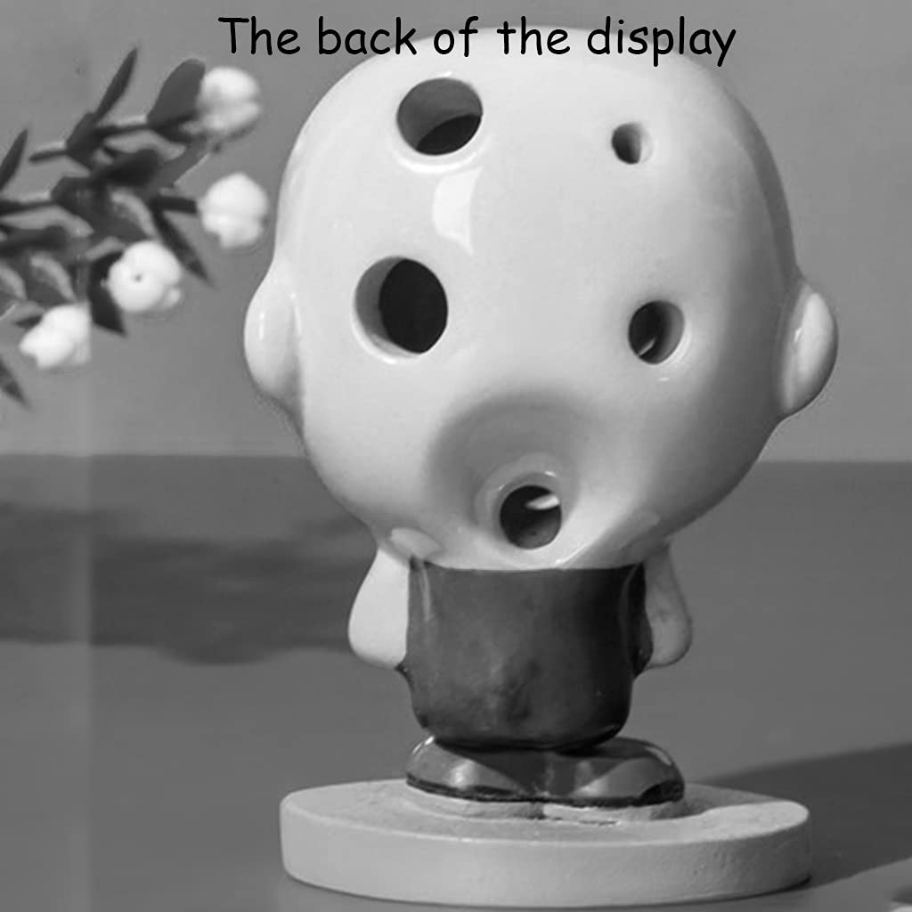Początkujący ćwiczą grę na ceramicznych instrumentach okaryna z 4 otworami(Humanoid Ocarina D)