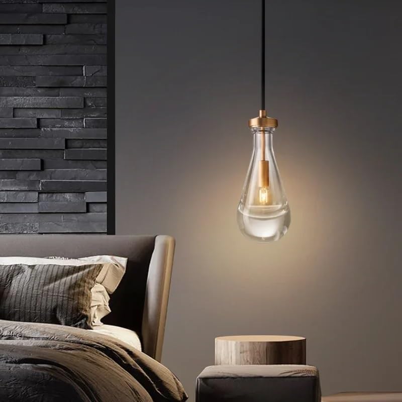 Lustre moderne en verre et laiton pour illuminer chaleureusement votre salle à manger