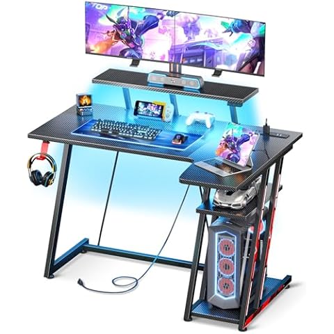 MOTPK Small Gaming Desk with LED Lights & Power Outlets, 39 Inch L Shaped Gaming Computer Desk with Storage Shelf, Gamer Desk with Monitor Stand, PC Gaming Table with Carbon Fiber Texture, Black Cover