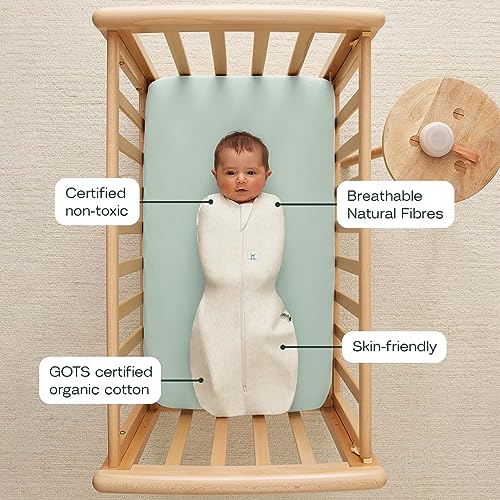 Image of ergoPouch Cocoon Swaddle Sack 1.0 TOG - Baby Sleep Sack, Gentle Snug Fit Helps Calm Startle Reflex, Ideal for Arms In /Out Sleeping, Soft Breathable Fabric for Better Sleep (6-12 Months, Oatmeal Marle)
