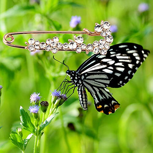 Épingle à nourrice papillon strass pour ajuster un décolleté plongeant