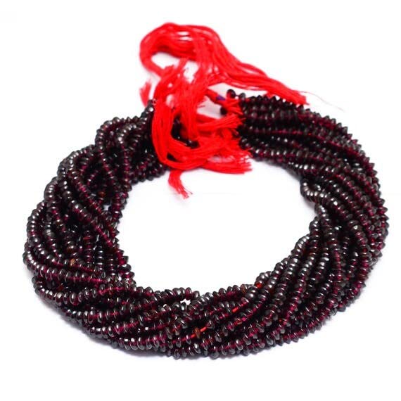 Garnet Button Beads perles de grenat pour un bijou chargé d'histoire