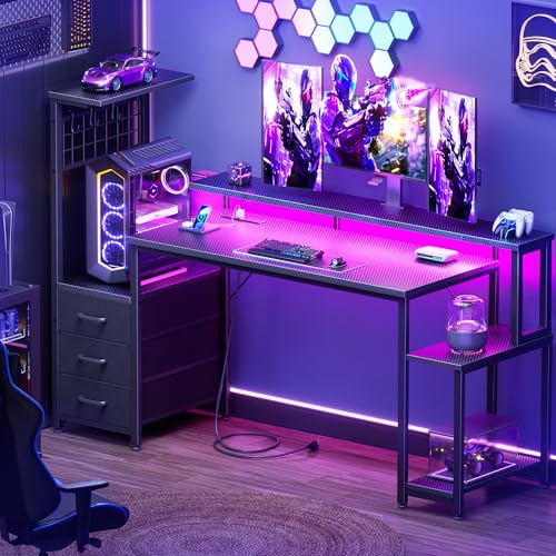 Image of Korfile 55 Inch Gaming Desk with Bluetooth LED Lights & Power Outlets,Computer Desk with Fabric Drawers & Hooks,Reversible Gamer Table with Monitor Stand for Game Room,Home Office,Carbon Fiber Black
