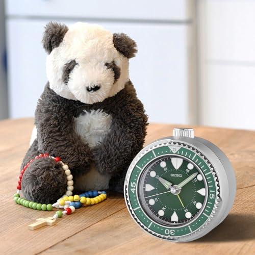 Image of Seiko Silver Portable Alarm Clock with Rotating Bezel, Quiet Sweep Second Hand & Snooze Function (Model: QHE207A | Size: 10.4 x 9.7 x 5.5 cm | Weight: 131 g)
