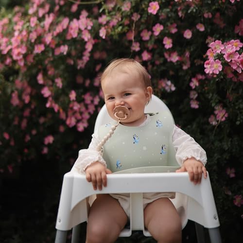 Image of mushie x Bluey Silicone Baby Bib | Adjustable Fit Waterproof Bibs (Bluey Ivory)