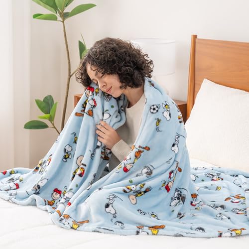 Image of Berkshire Blanket Peanuts VelvetLoft Cute Character Snoopy Plush Throw Blanket,Snoopy the Athlete Closed in Blue,Throw 55 in x 70 in (Official Peanuts Product)