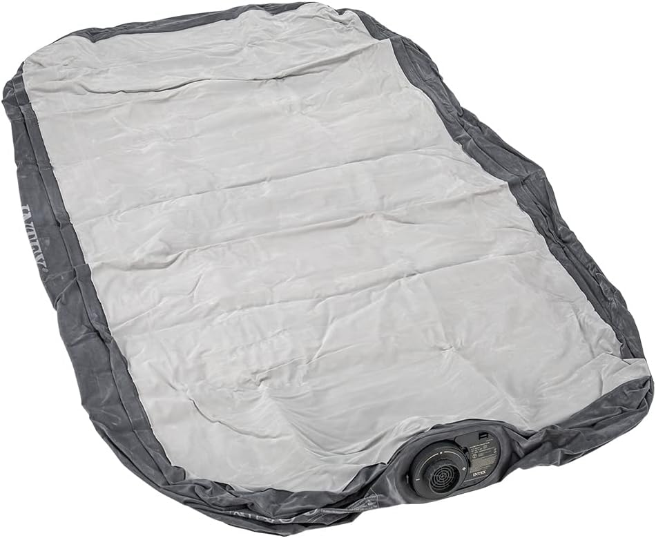 Underside view of the Intex airbed showing the integrated electric pump and valve system.
