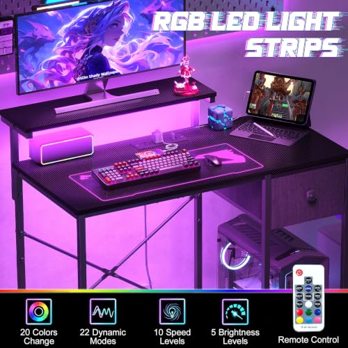 Image of X-cosrack 33.5 inch Small Gaming Desk with LED Lights & Power Outlets, Drawers | Computer Desk with Fabric Drawer & Side Hook, Reversible Table with Monitor Stand for Game Room, Bedroom, Carbon Fiber Black