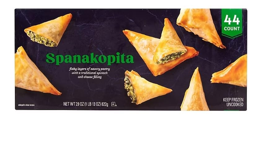 Spanakopita, a beloved Greek pastry that delights the senses with its layers of flaky phyllo dough and savory spinach filling. Crafted with care, each bite of this Spanakopita delivers a symphony of flavors and textures. The Spanakopita features a luscious filling made from tender spinach leaves, aromatic herbs, tangy feta cheese, and delicate spices, all enveloped in delicate layers of golden, buttery phyllo pastry. The result is a harmonious blend of savory and herbaceous notes, accented by the crispiness of the pastry shell. Perfect for entertaining or as a delightful snack any time of day, Spanakopita is a versatile treat that pairs wonderfully with a variety of dishes or stands on its own as a satisfying appetizer. [ 29 oz , 1.8 lb ]