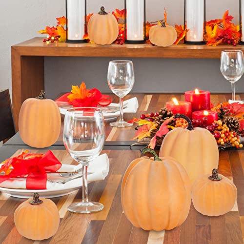 Image of Winlyn 7 Pcs Assorted Sizes Artificial Fall Pumpkins Faux Orange Decorative Foam Pumpkins for Gifts Fall Baby Shower Wedding Thanksgiving Halloween Table Centerpiece Mantel Decor