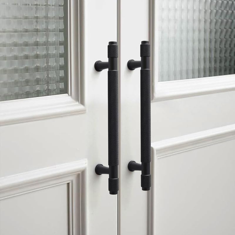 Manijas de puerta y cajones en color negro y oro con medida estándar de 128 mm para cocina