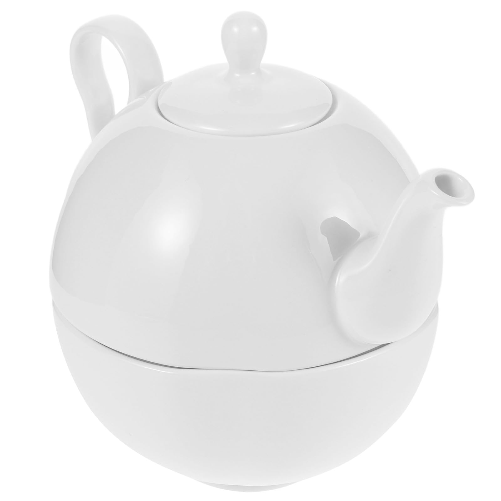 Théière et tasse en porcelaine pour savourer un thé floral à la maison