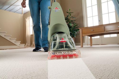 BISSELL QuickSteamer cleaning a carpet, showing a clean path