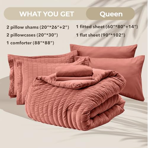 Image of HYMOKEGE Coral Queen Comforter Set Seersucker 7 Pieces, All Season Luxury Bed in a Bag Queen for Bedroom, Bedding Set with Comforter, Sheets, Pillowcases & Shams