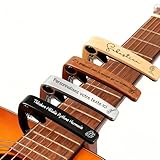 Le cadeau idéal pour les passionnés de guitare : Pour les guitaristes, un capo est bien plus qu'un simple accessoire ; c'est l'expression de leur passion. Un capo gravé à votre nom ou avec un texte est parfait pour les enfants qui apprennent la guitare, les guitaristes, les membres de groupes et les musiciens. Ce n'est pas seulement un outil pratique, mais aussi un signe d'attention, de compréhension et de soutien inconditionnel à leurs rêves musicaux. Cette surprise est inoubliable