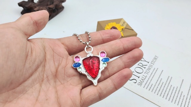 Amazon.com: JJBA Red Stone of Aja JoJo Necklace - Jotaro Stand