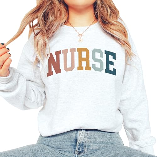 Varsity Nurse Sweatshirt, Nursing School Grad Sweatshirt, Nurse Week, New Nurse Gift, RN Graduation Shirt, Unisex Crewneck Sweatshirt Sand2