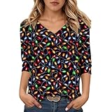 Col en V flatteur et manches trois-quarts offrant une élégante et un style moderne intemporel