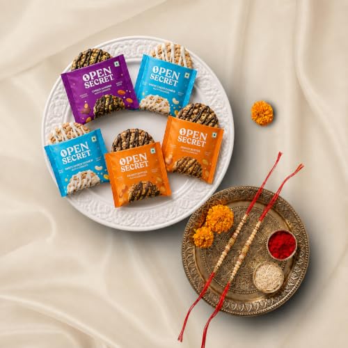 Image of Open Secret Rakhi Set for Brother | Combo of 8 | Rakhi Gift for Brother & Bhabhi, Gift Hamper, Rakshabandhan Gifts for Sister, Assorted Cookies with Rakhis & Roli Chawal Tilak Set