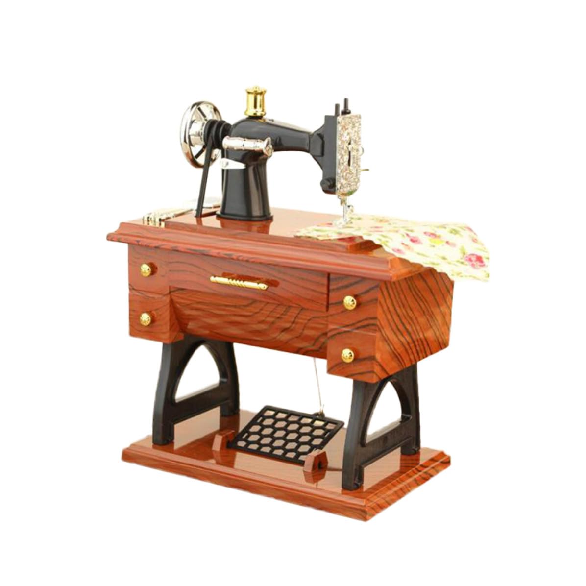 Caja de música máquina de coser retro para decorar el salón en Navidad