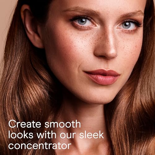 Image of Conair Worldwide Folding Handle Hair Dryer with Concentrator & Diffuser, 1875W Travel Blow Dryer with Smart Voltage Technology, Ionic Conditioning Fights Frizz, 3 Heat & 2 Speed Settings, Purple