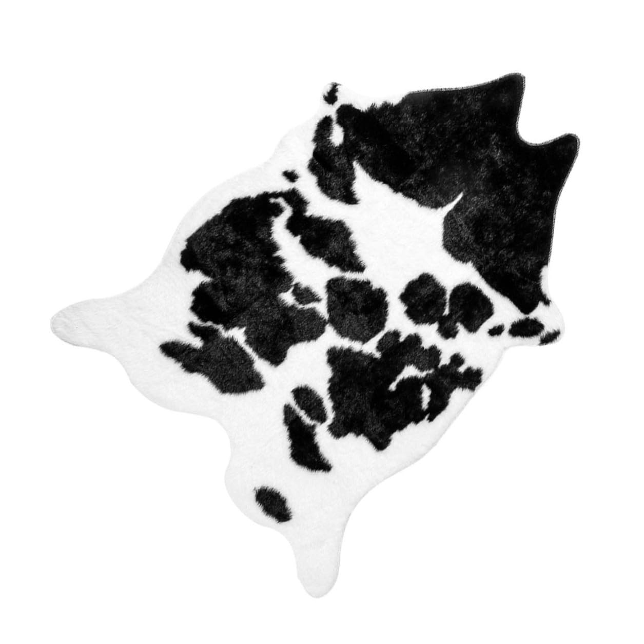 Tapis peau de vache noir et blanc pour cocooning et déco de salon