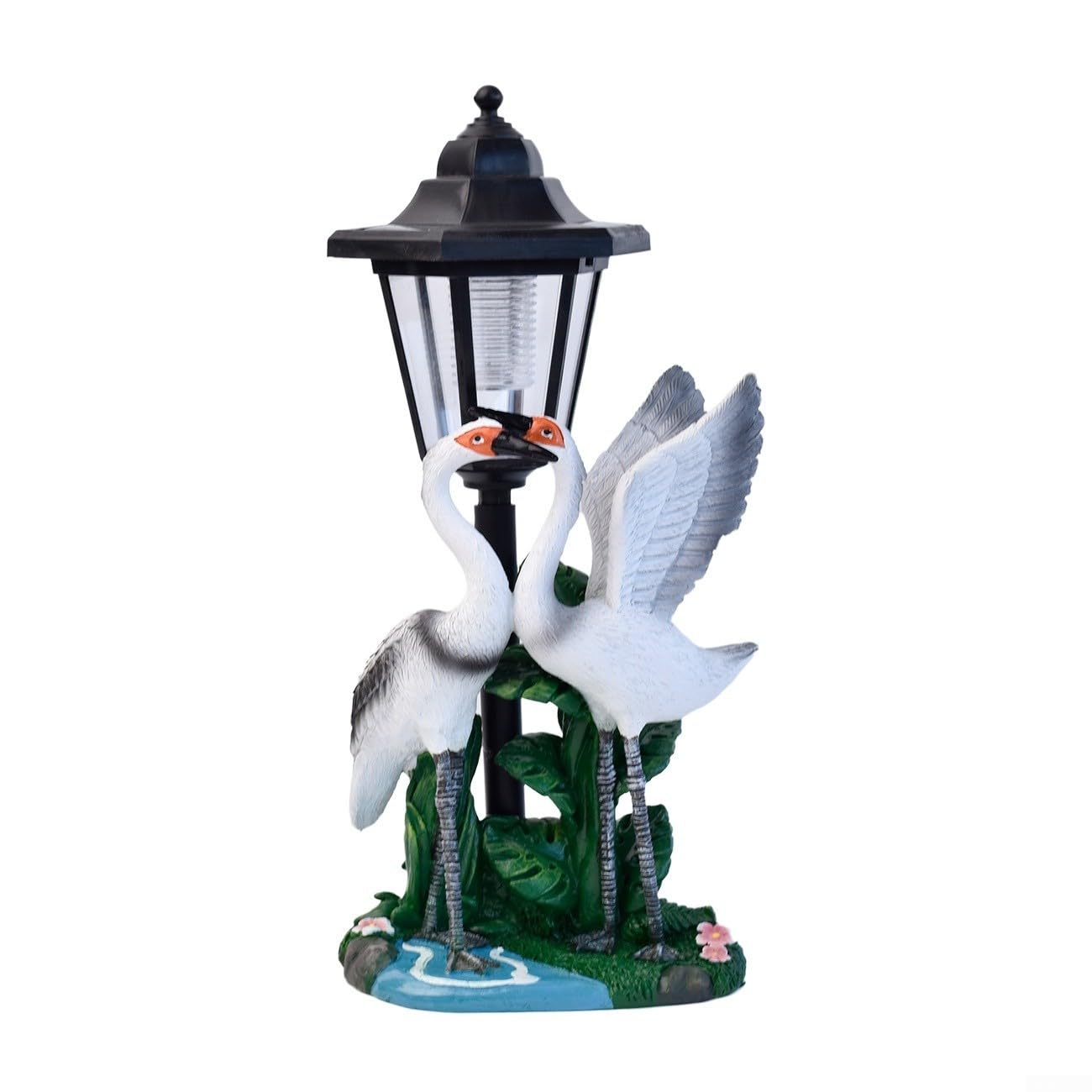 Luce solare del giardino della statua della coppia di uccelli