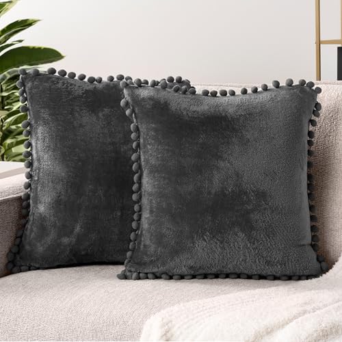 PAVILIA Dark Gray Throw Pillow Covers with Pom Pom 18x18 Set of 2, Decorative Pillow Cases for Bedroom Aesthetic, Small Throw Pillows Set for Bed, Velvet Euro Plush Cushion Covers for Sofa Couch