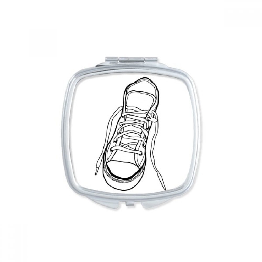 Miroir de poche pour retouches maquillage dans votre sac à main de voyage