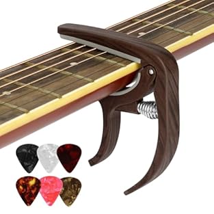 High Quality: This capo is made of high-quality aluminum plastic material with good anti-rust performance. The steel spring is stable, fatigue-resistant and has a long service life. It can ensure that the guitar and strings are not damaged Easy to Us...