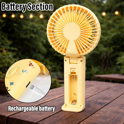 Image of WISHKEY Portable Handheld Mini Fan Cute Dragon Print- USB /Battery Rechargeable, High-Speed Cooling for Travel, Office & Outdoor Use,Rechargeable Fan with 3 Speed Modes- Yellow