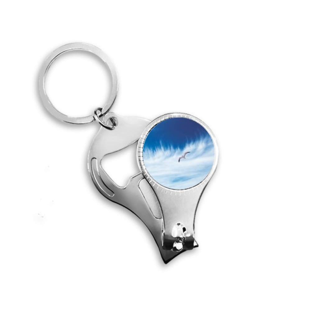 Pince à ongles oiseau bleu ciel et décapsuleur porte-clés Art Déco