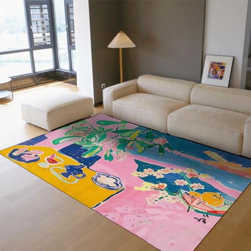 Tapis Matisse rose devant le canapé pour réchauffer la cheminée