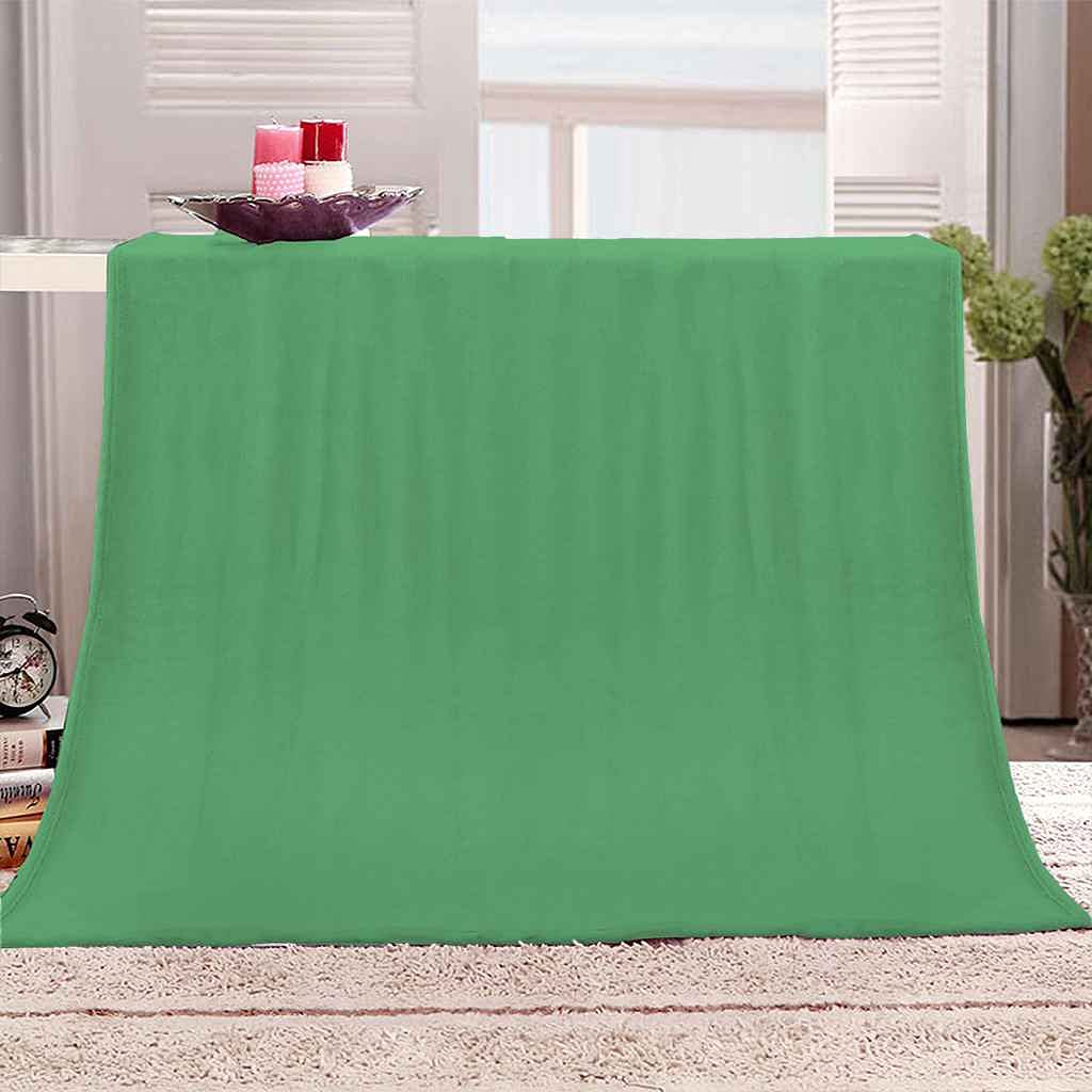 Plaid lit flanelle vert chaud et hypoallergénique contre le froid hivernal