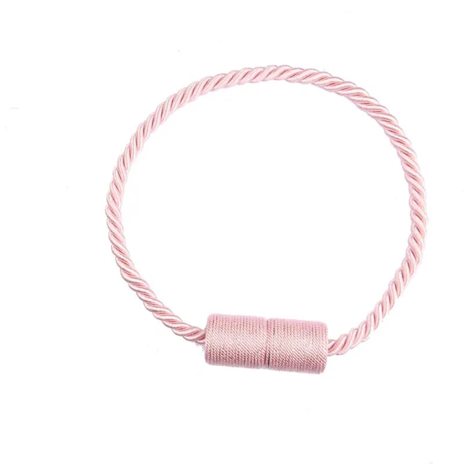 Cortinas caídas solucionadas con alzapaños magnéticos OUdini rosa de hogar