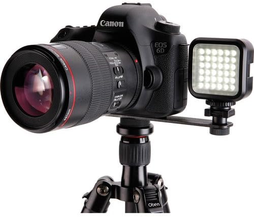 Genaray LED-2100 light attached to a camera using the off-center mounting bracket.