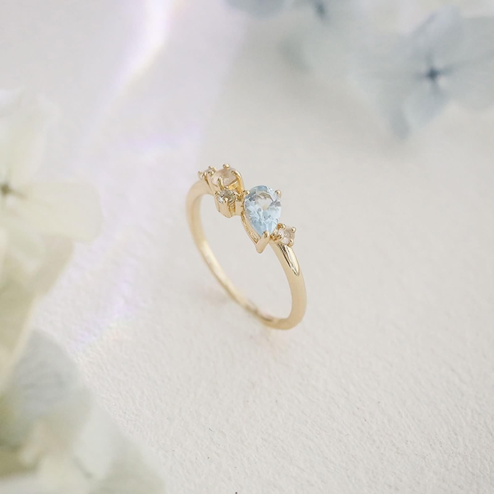 Anillo de compromiso de oro 9 K/14 K/18 K con gotas de topacio azul claro, forma de lágrima