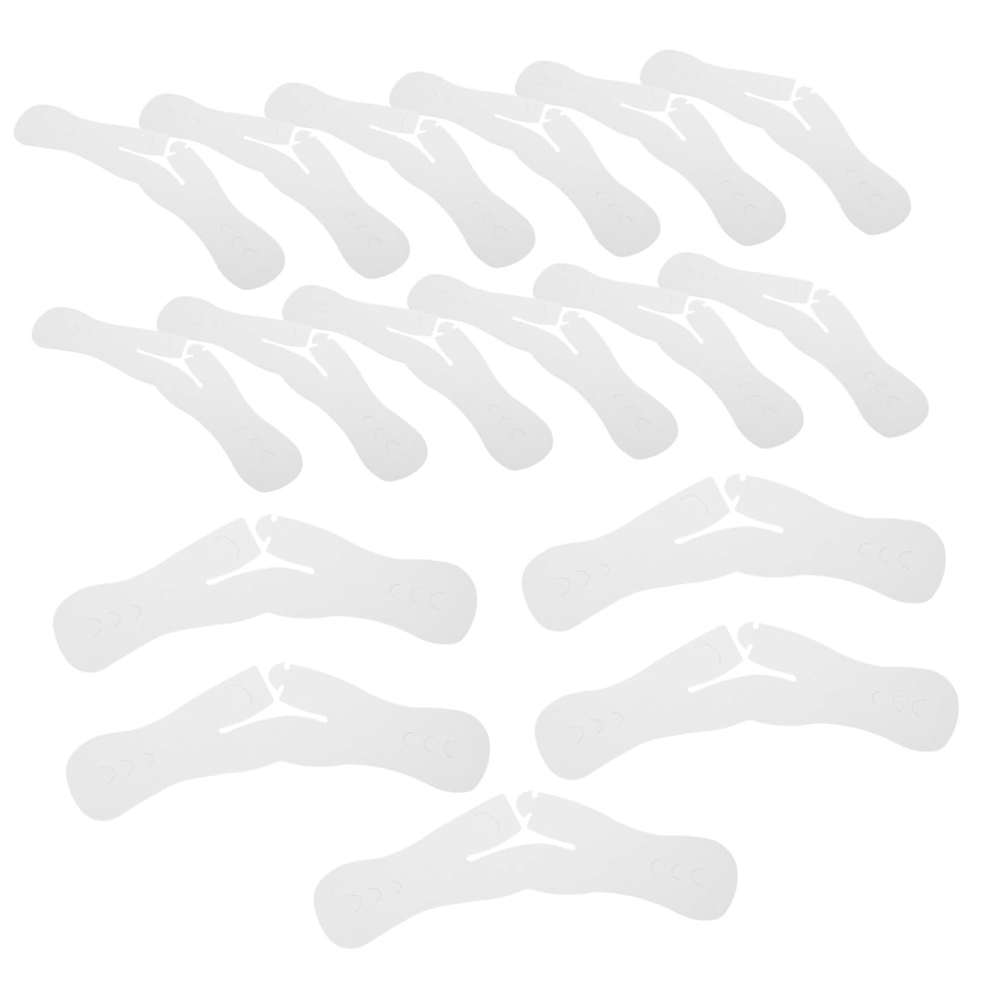 Protège-épaules en papier blanc pour éviter les marques de cintre sur vos costumes délicats