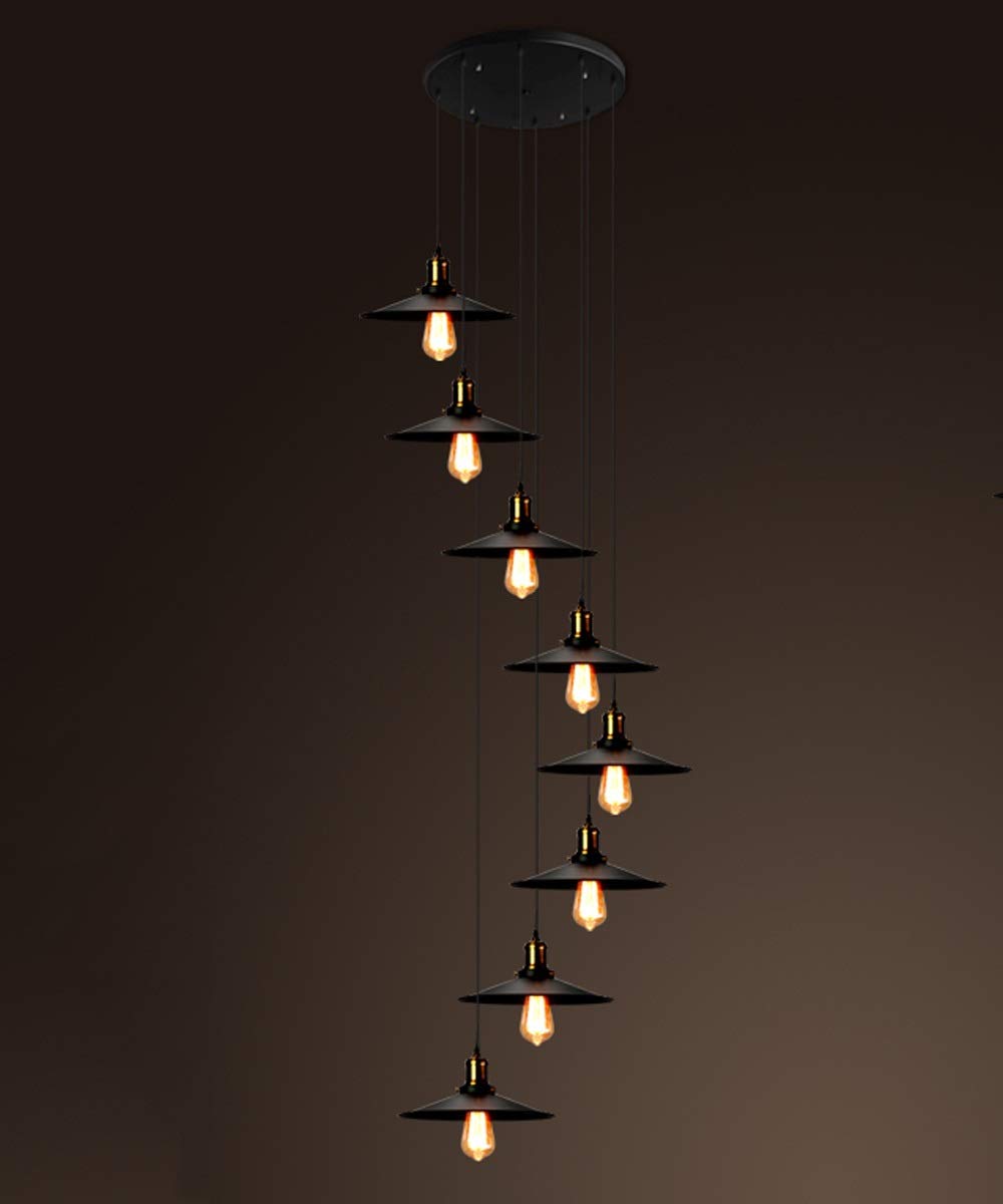 Plafonnier minimaliste moderne pour salon avec grande hauteur sous plafond et escalier