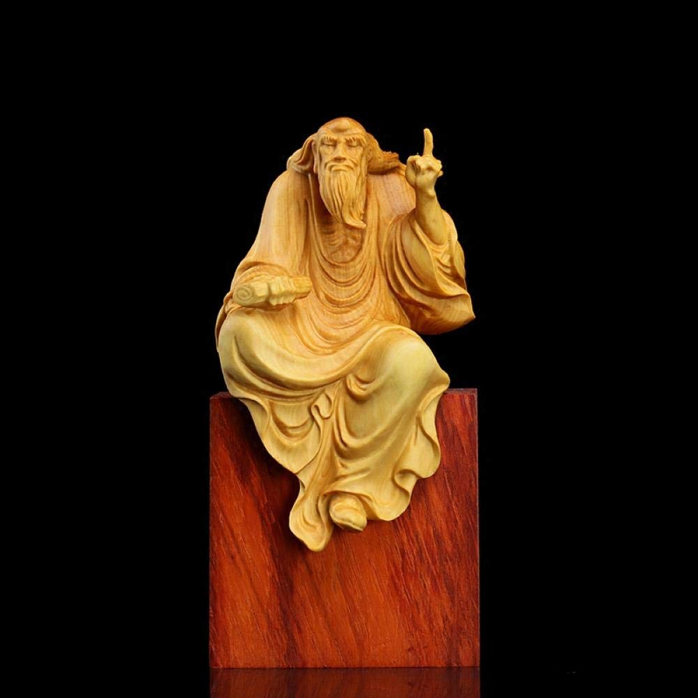 Décoration maison zen avec cette sculpture personnage en bois pour salon apaisant