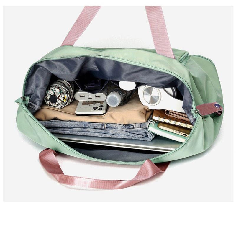 Image of WildHorn Nylon Duffel Bag for Women | Folding Carry-on Expandable Large Capacity DurableLightweight Travel & Gym Duffel with Front Zipper Pocket (Pista Green)