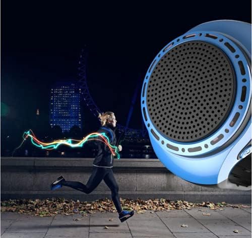 A person running at night with the ORIDECOR Wireless Speaker Watch on their wrist, showing colorful light trails.