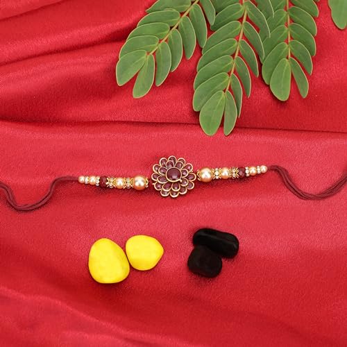 Image of Riddhika Ventures Alluring Gold Plated Floral and Pearl Rakhi (Bracelet) with Roli Chawal & Greeting Card
