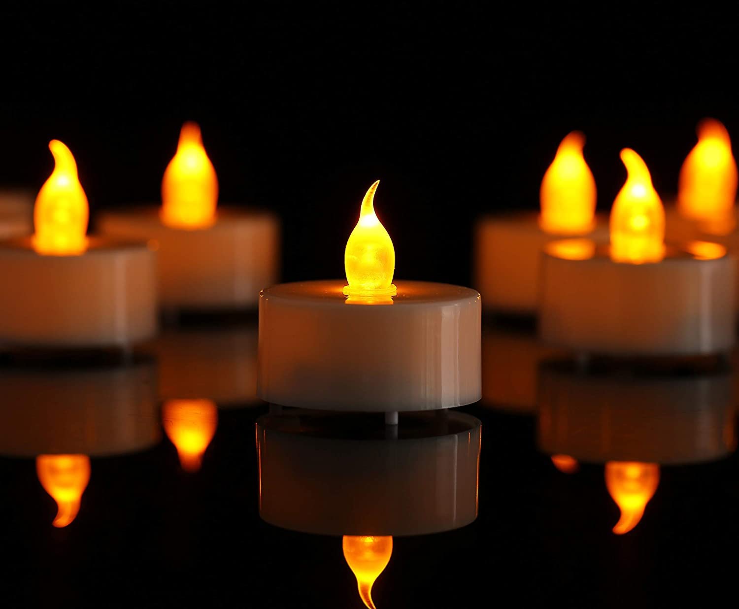 Flameless Candle Lights, ELECDON 12 Pack Realistic and Bright Flickering Battery Operated Flameless LED Tea Lights, Electric Fake Candle in Warm Yellow