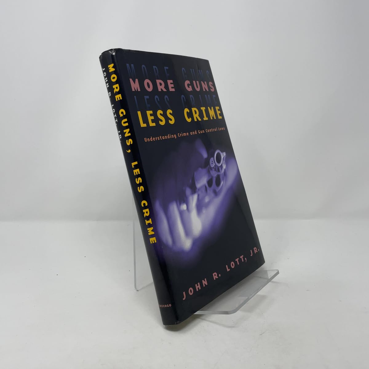 More Guns, Less Crime: Understanding Crime and Gun Control Laws (Studies in Law and Economics) cover