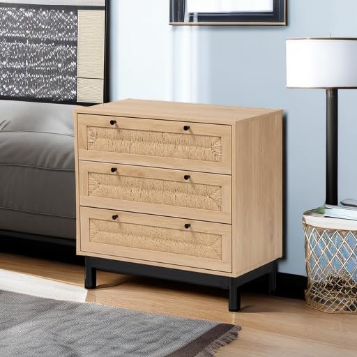 Close-up of a black round drawer knob on the Cherelle cabinet