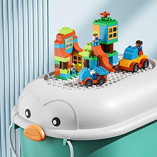 Boîte de rangement pour vêtements de bébé et blocs dans le salon